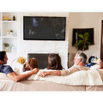 A family watches TV in their home