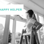 A woman cleaning a window and the Happy Helper logo