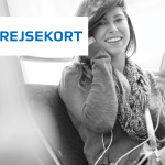 Woman on a train ride smiling at the camera. Rejsekort logo.